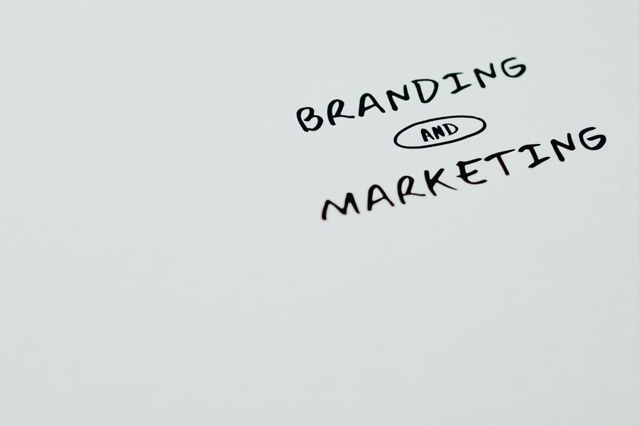 Branding and marketing collateral printed on white paper